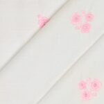 Tessuto Piquet di Cotone Ricamato - Fiore Rosa Baby Fondo Bianco - Mezzo Metro