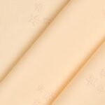 Tessuto Piquet di Cotone Ricamato - Stella Beige - Mezzo Metro