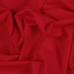 Tessuto Lycra Opaca. Si tratta di un materiale creato apposta per aderire alla figura corporea. Elastico e allungabile è dunque molto usato nel mondo dello sport