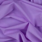 Tessuto Lycra Opaca. Si tratta di un materiale creato apposta per aderire alla figura corporea. Elastico e allungabile è dunque molto usato nel mondo dello sport