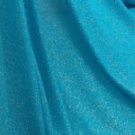 Tessuto Mesh (Tulle) Bielastico Glitter Polvere di Stelle - al Metro - Turchese Glitter Argento