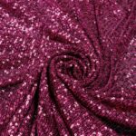Tessuto Paillettes su Tulle Elastico - al Metro - Magenta Paillettes Magenta