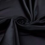 Tessuto Duchesse Regina Tabo Fissa - al Metro - Nero Riflesso Glicine
