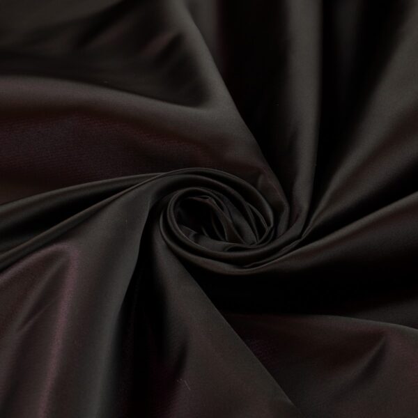 Tessuto Duchesse Regina Tabo Fissa - al Metro - Nero Riflesso Rosa