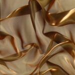 Dettaglio organza lucida ambra scuro - trasparenza e riflessi