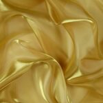 Dettaglio organza lucida oro - trasparenza e riflessi