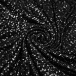 Tessuto Paillettes su Tulle Elastico - al Metro - Nero